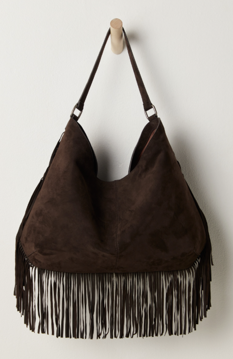Brown suede handbag with fringes on a white background