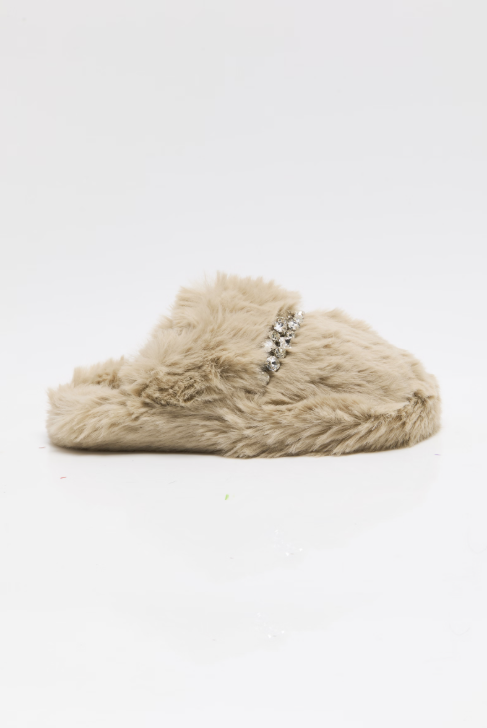 A single beige faux fur slide slipper decorated with a small silver rhinestone embellishment on the side, set against a plain white background.