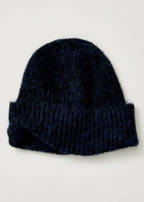 A dark navy blue knit beanie hat with a folded cuff, shown against a plain light gray background.
