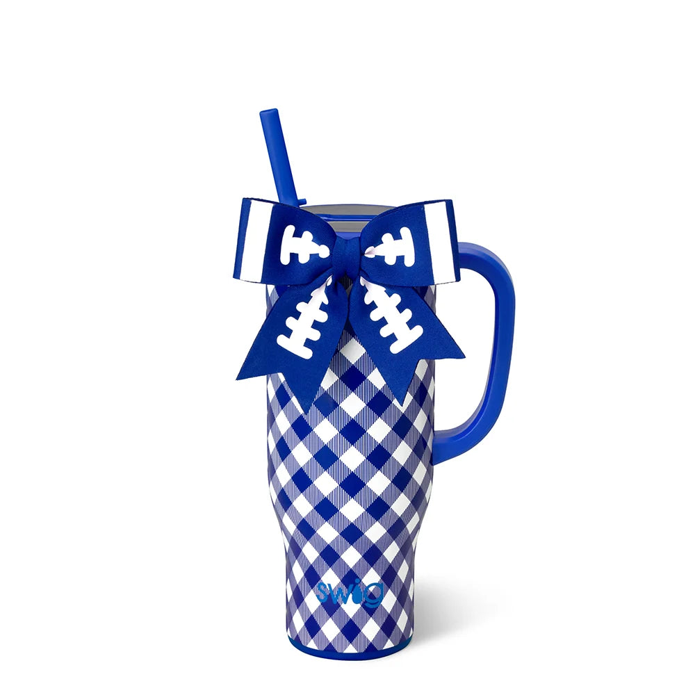 A royal blue and white gingham handled tumbler with a blue handle and straw, decorated with a blue and white football-themed bow on the handle, and the word &