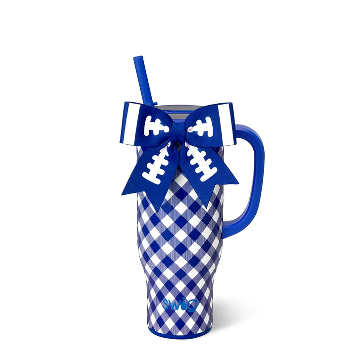 A royal blue and white gingham handled tumbler with a blue handle and straw, decorated with a blue and white football-themed bow on the handle, and the word &