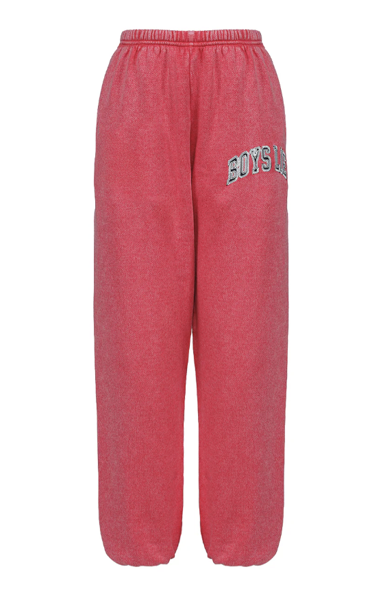 Red sweatpants with Boys Lie writing on white background