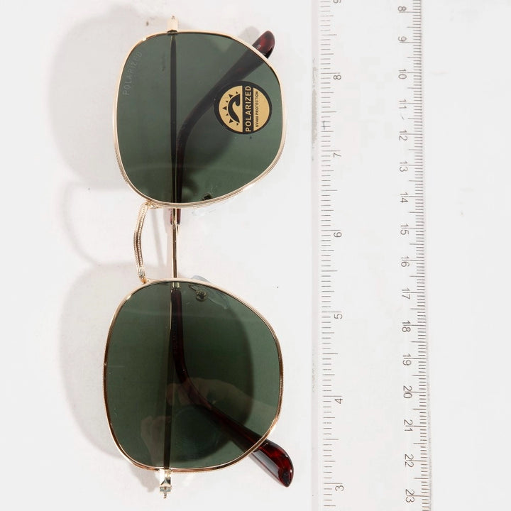 metal frame sunglasses on plain background