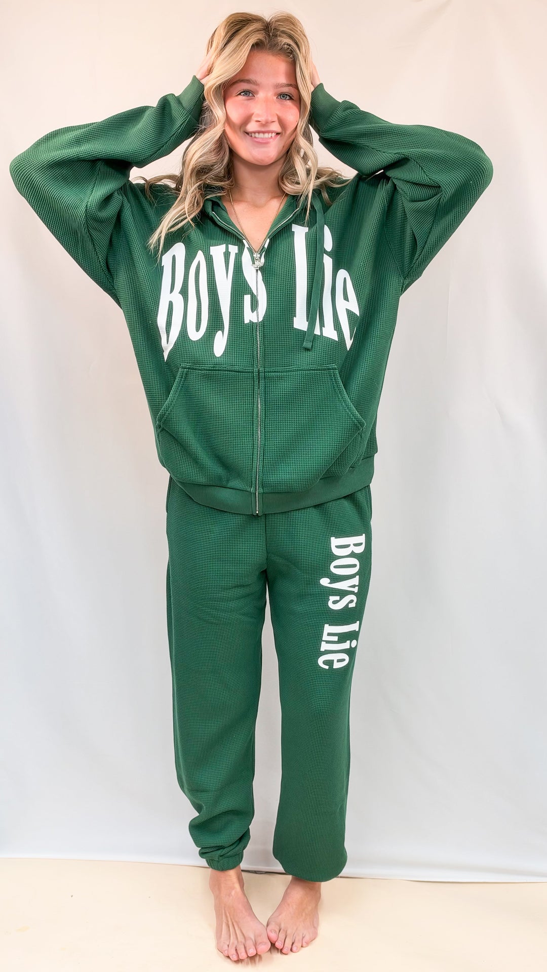 Woman wearing matching green set with &