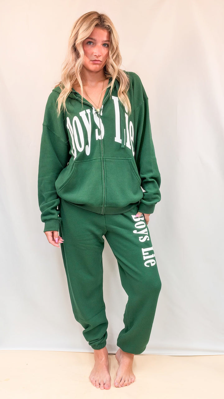 Woman wearing green matching set with &