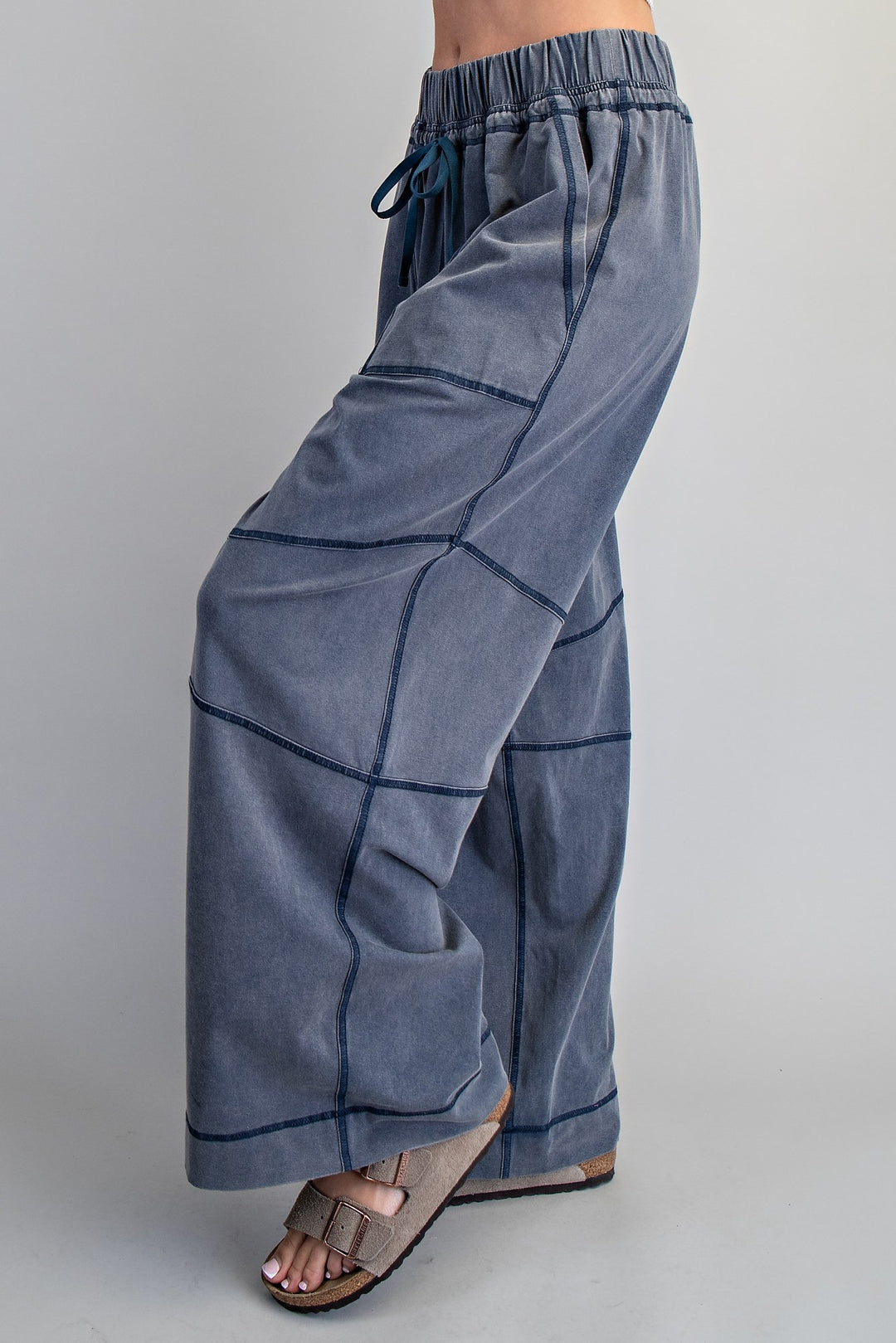 Blue wide-leg pants with a plain background