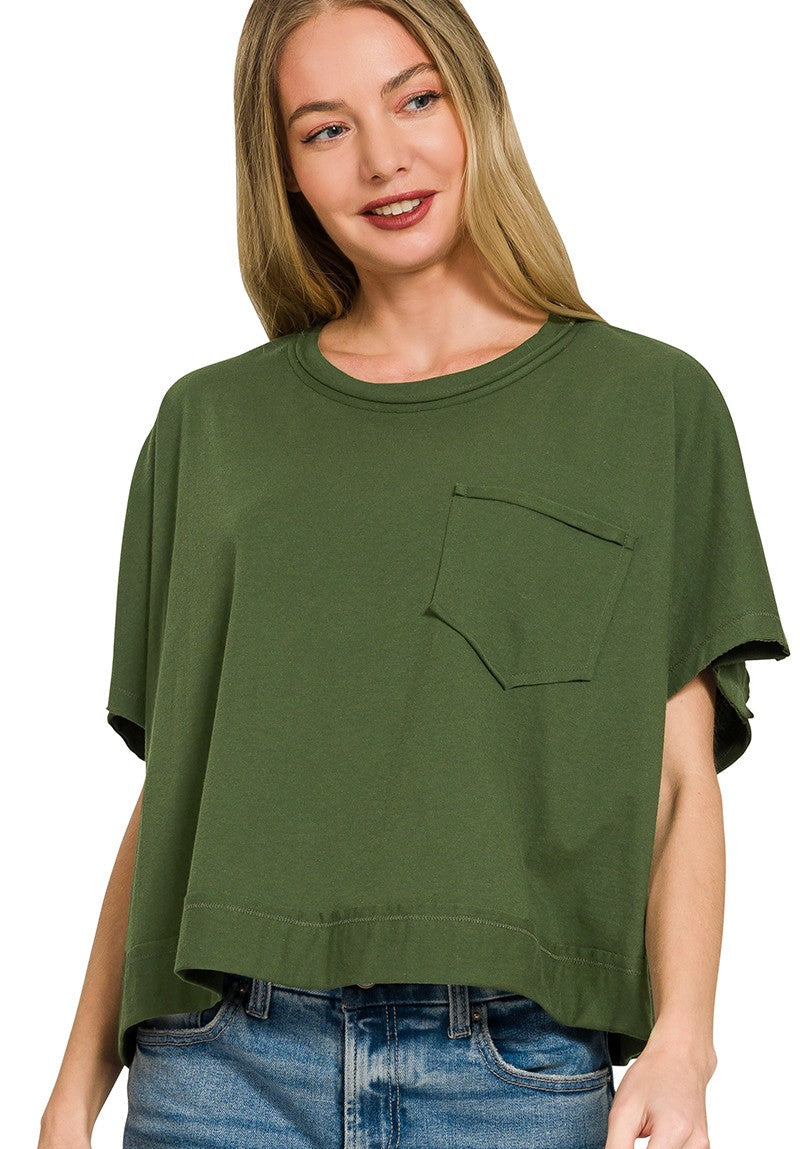 Woman wearing green tee with pocket on white background