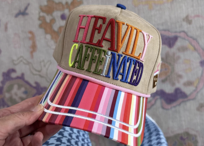 Trucker hat with bright stripe bill and &