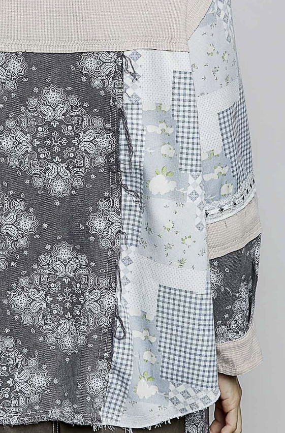 Skirt with patchwork pattern featuring floral, checkered, and paisley designs.