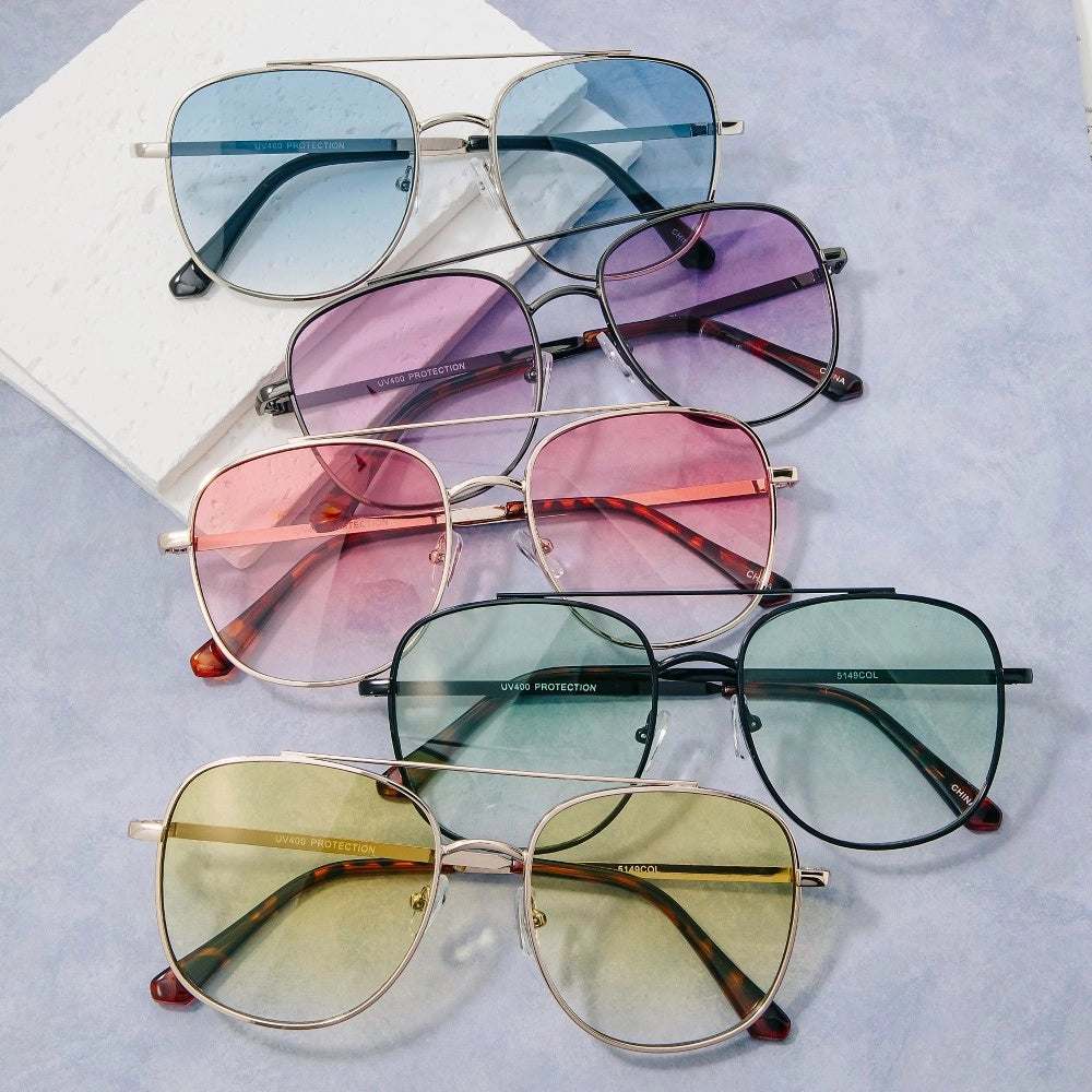 Five pairs of sunglasses with different colored lenses on a light gray background