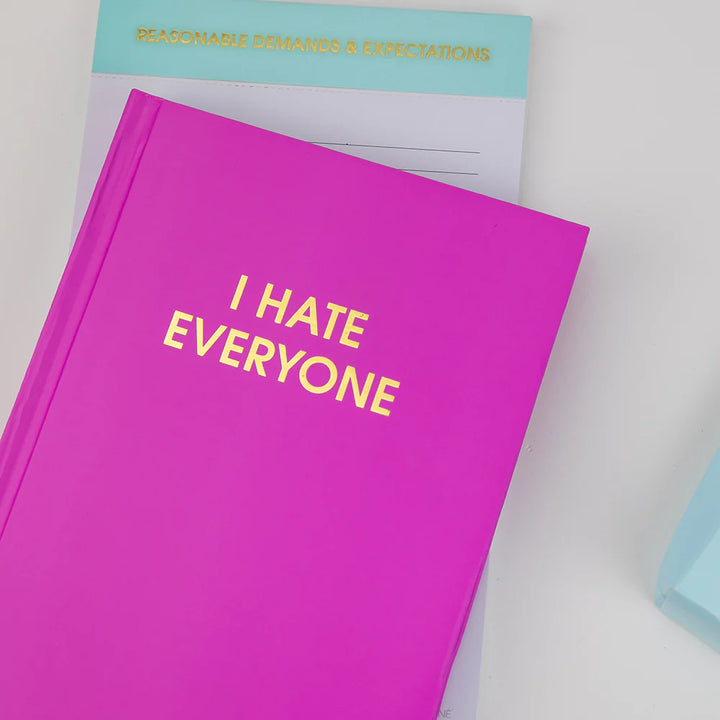 Purple journal on white background
