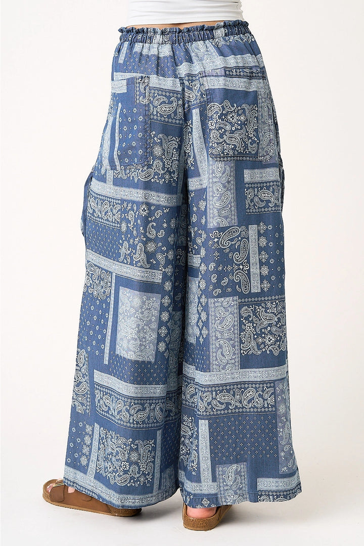 Blue patterned pants on a white background