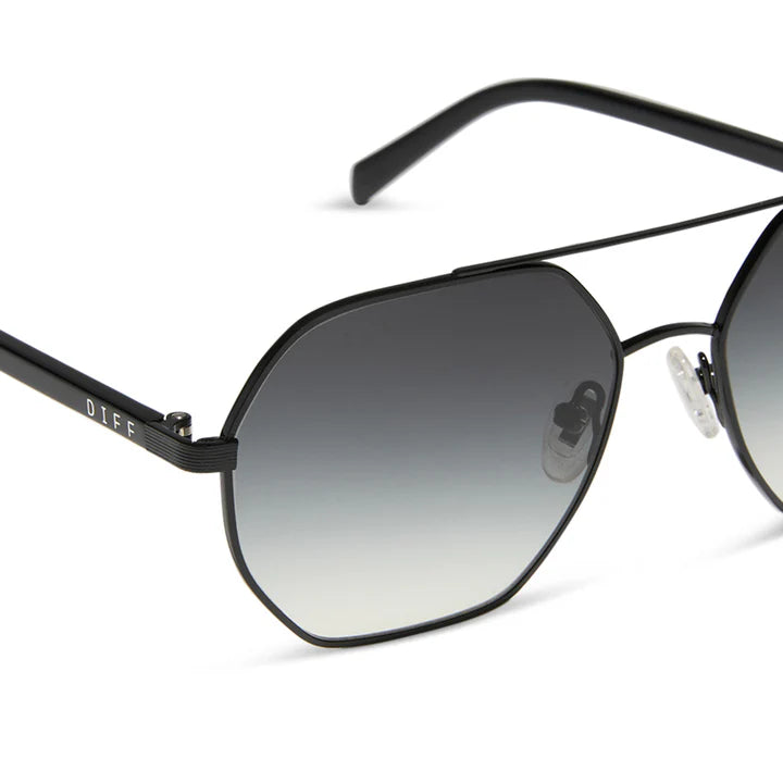Black sunglasses with gradient lenses on a white background