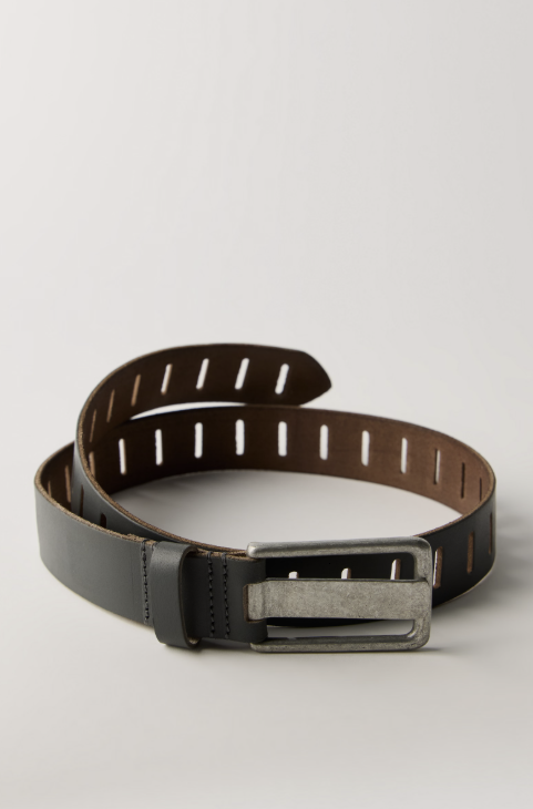 Dark grey slotted belt on beige background
