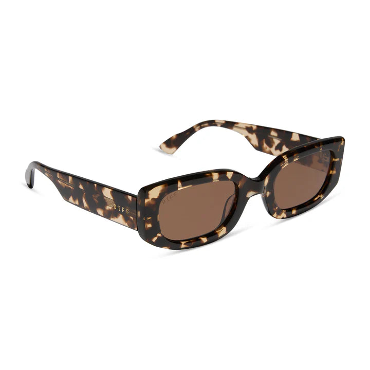 Tortoiseshell sunglasses with brown lenses on a white background