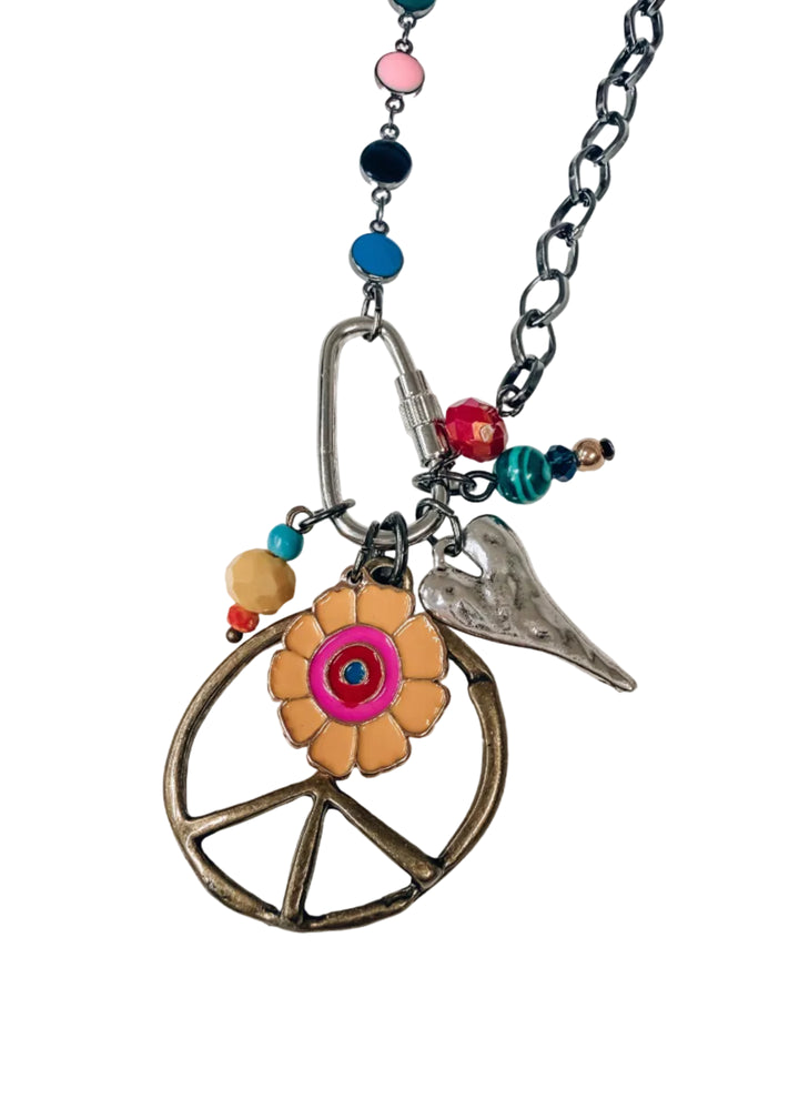 Chain necklace with multiple colorful charms on white background