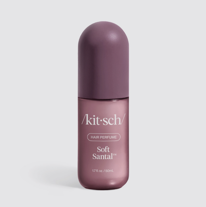 Kitsch hair perfume on white background