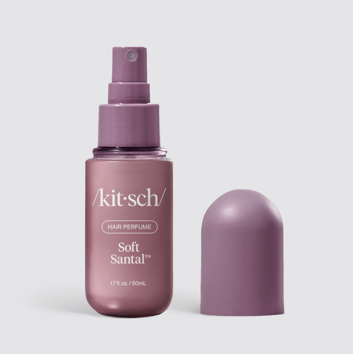 Kitsch hair perfume on white background