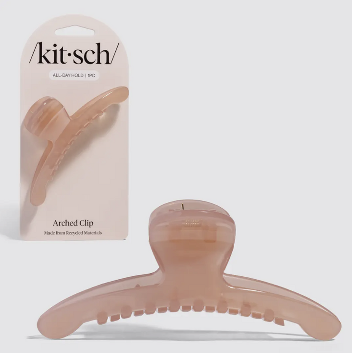 Arched claw clip with cardboard packaging on white background