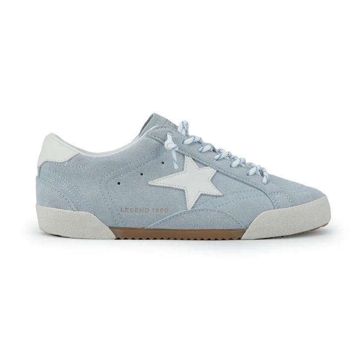 Light blue sneaker with a white star on a white background