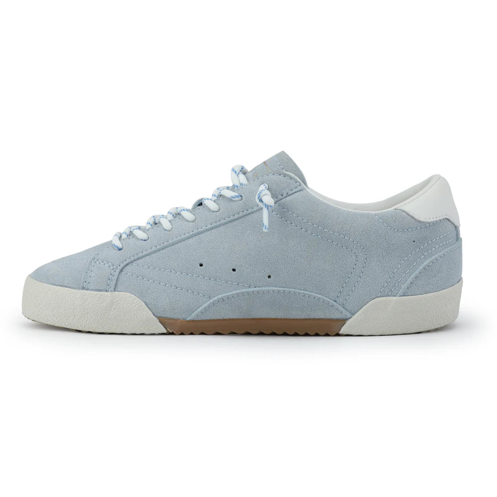 Light blue sneaker with white sole on a white background