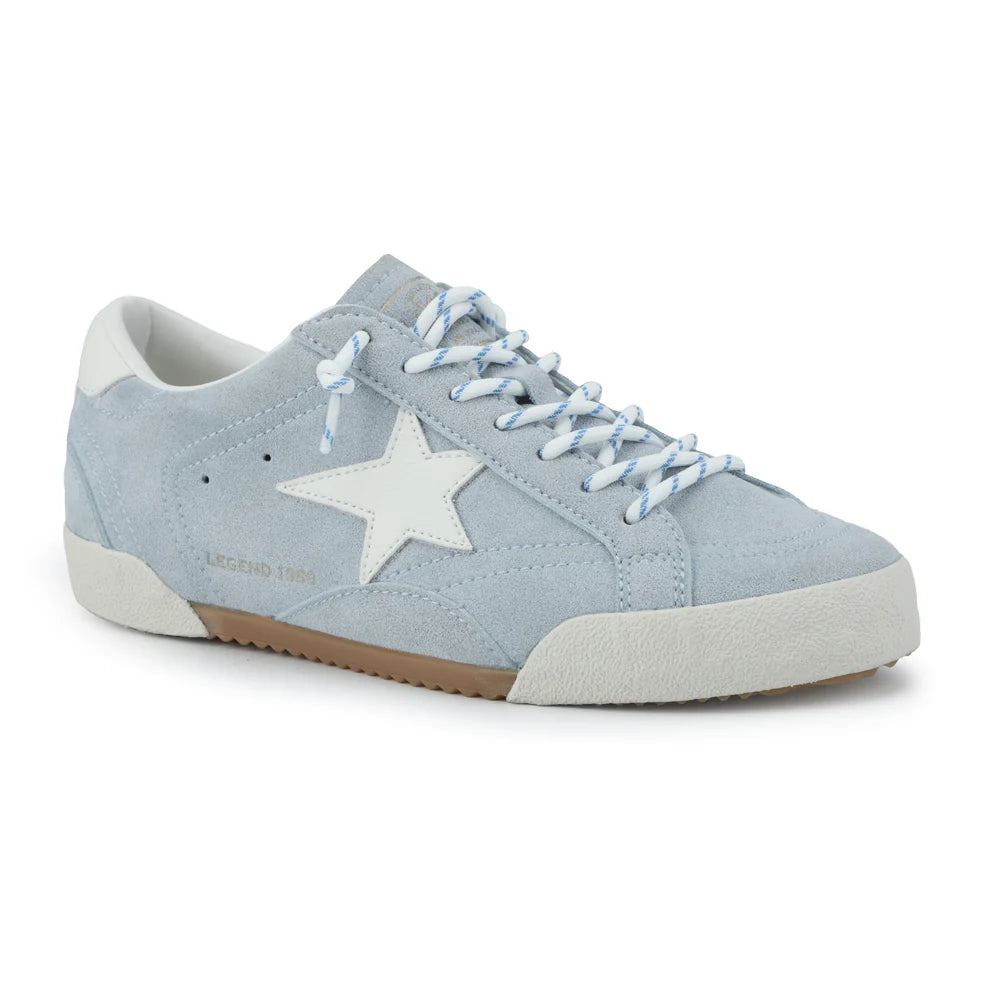 Light blue sneaker with a white star on a white background