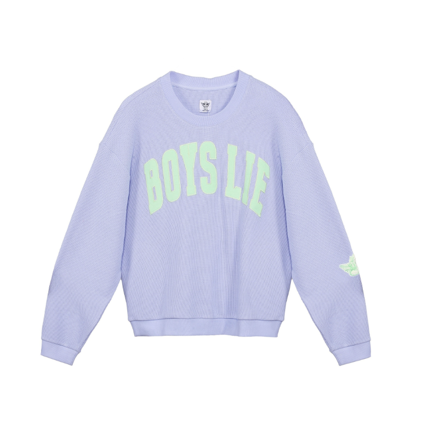 A light lavender crewneck sweatshirt with &