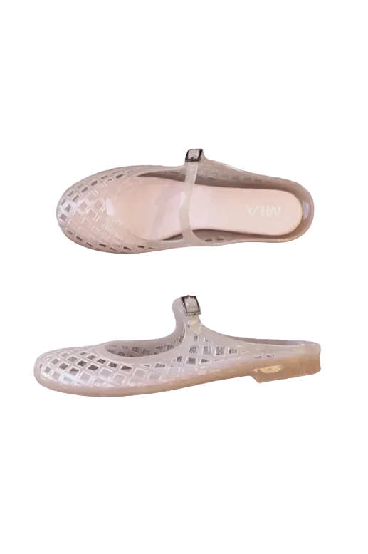 A pair of light pink jelly shoes with a cutout lattice pattern and a small buckle strap, resting on a white background.