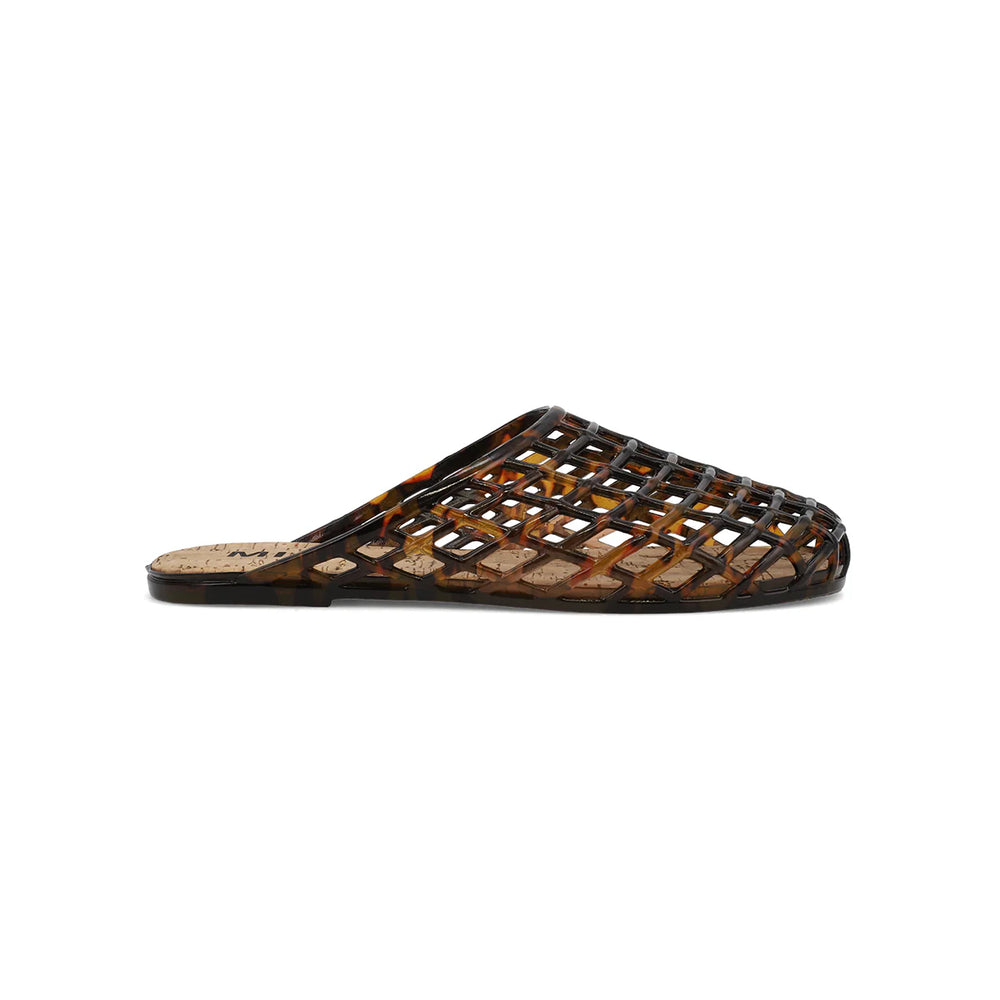 Tortoise colored jelly shoe with cork footbed on white background