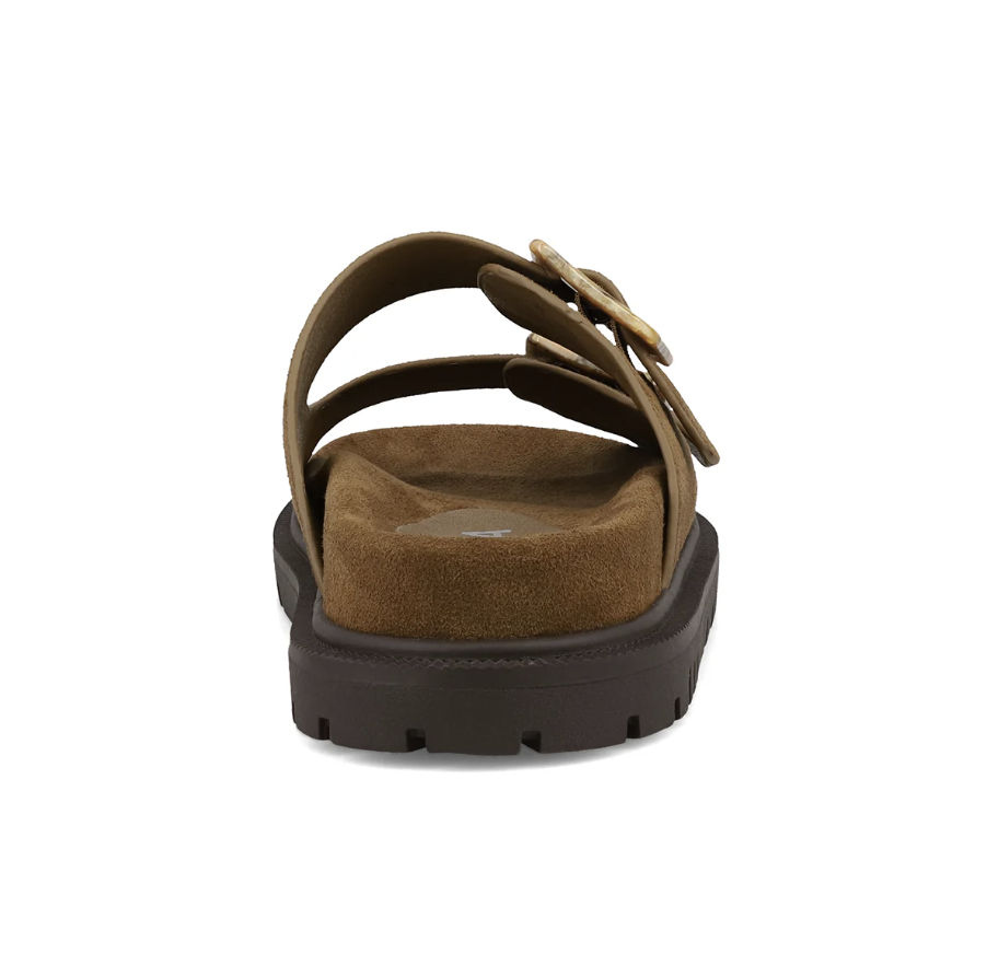 A single brown slide sandal with a wide strap featuring a decorative buckle detail, shown from a rear three-quarter view on a plain white background.