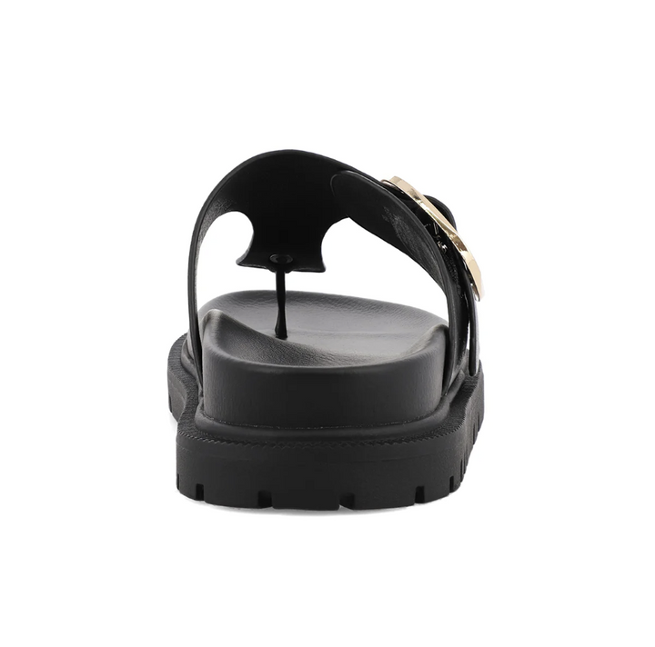 Black sandal with a strap on a white background