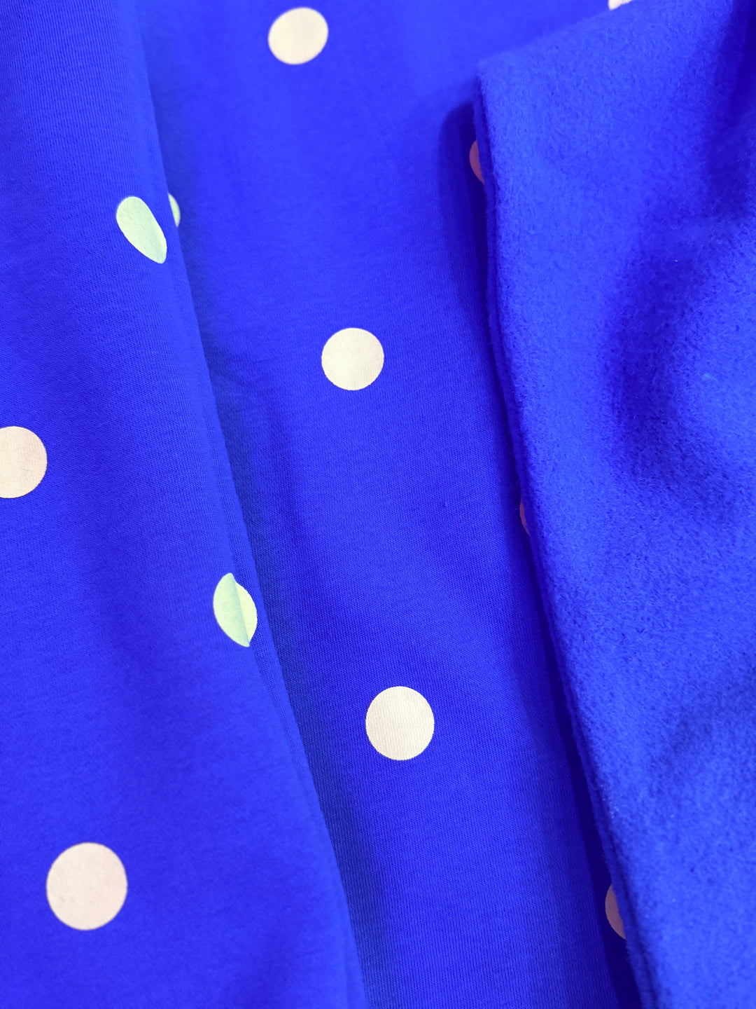 Blue fabric with yellow polka dots