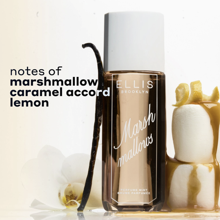 Ellis Brooklyn Marshmallows perfume mist bottle with a white cap, shown with marshmallows, a vanilla bean, and lemon slices on a white background with text reading &