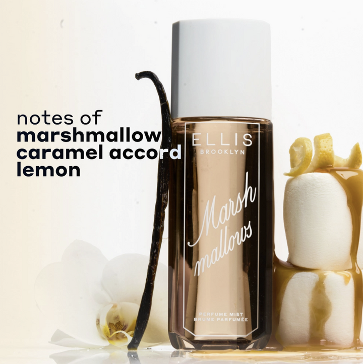 Ellis Brooklyn Marshmallows perfume mist bottle with a white cap, shown with marshmallows, a vanilla bean, and lemon slices on a white background with text reading &