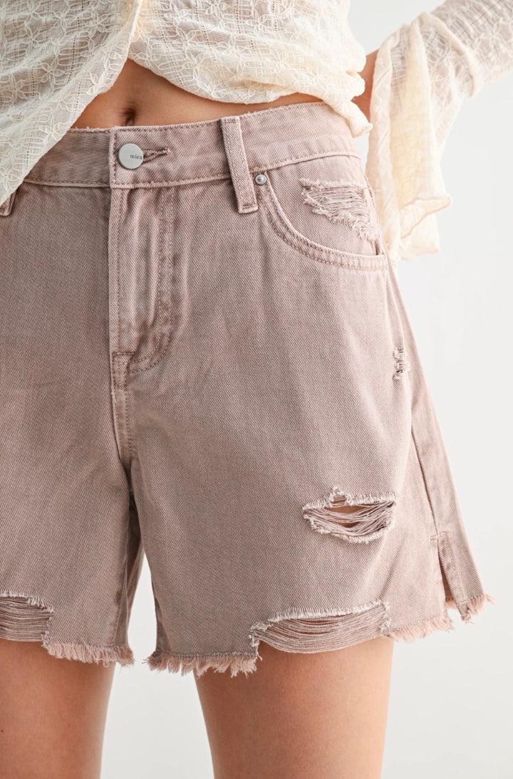 Denim shorts with a white background