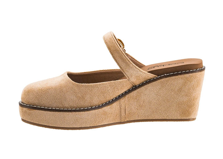 Single suede wedge shoe on white background