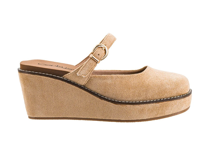 Single suede wedge shoe on white background
