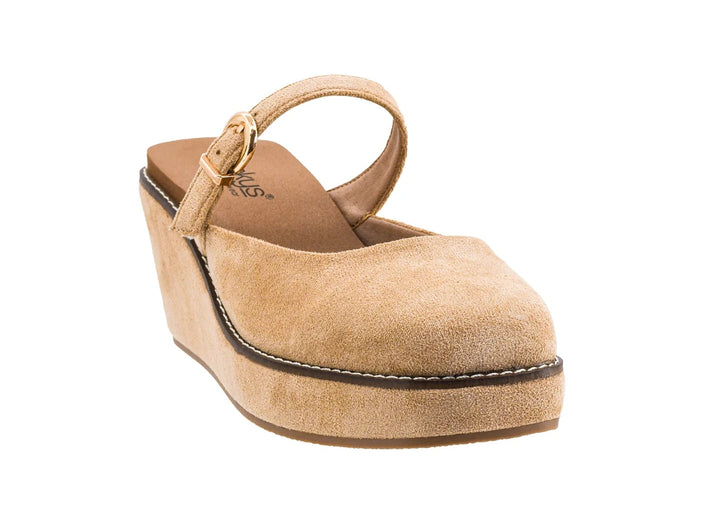 Single suede wedge shoe on white background