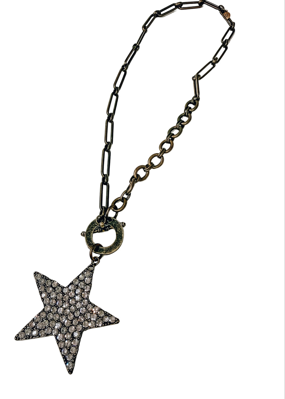 Gold necklace with pave star pendant on white background