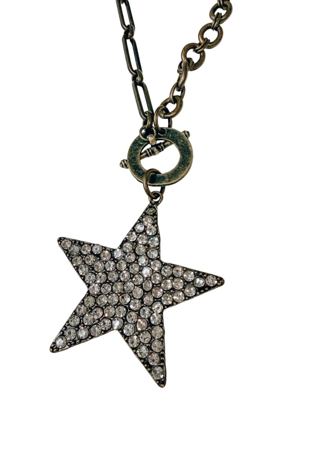 Gold chain necklace with large pave star pendant on white background