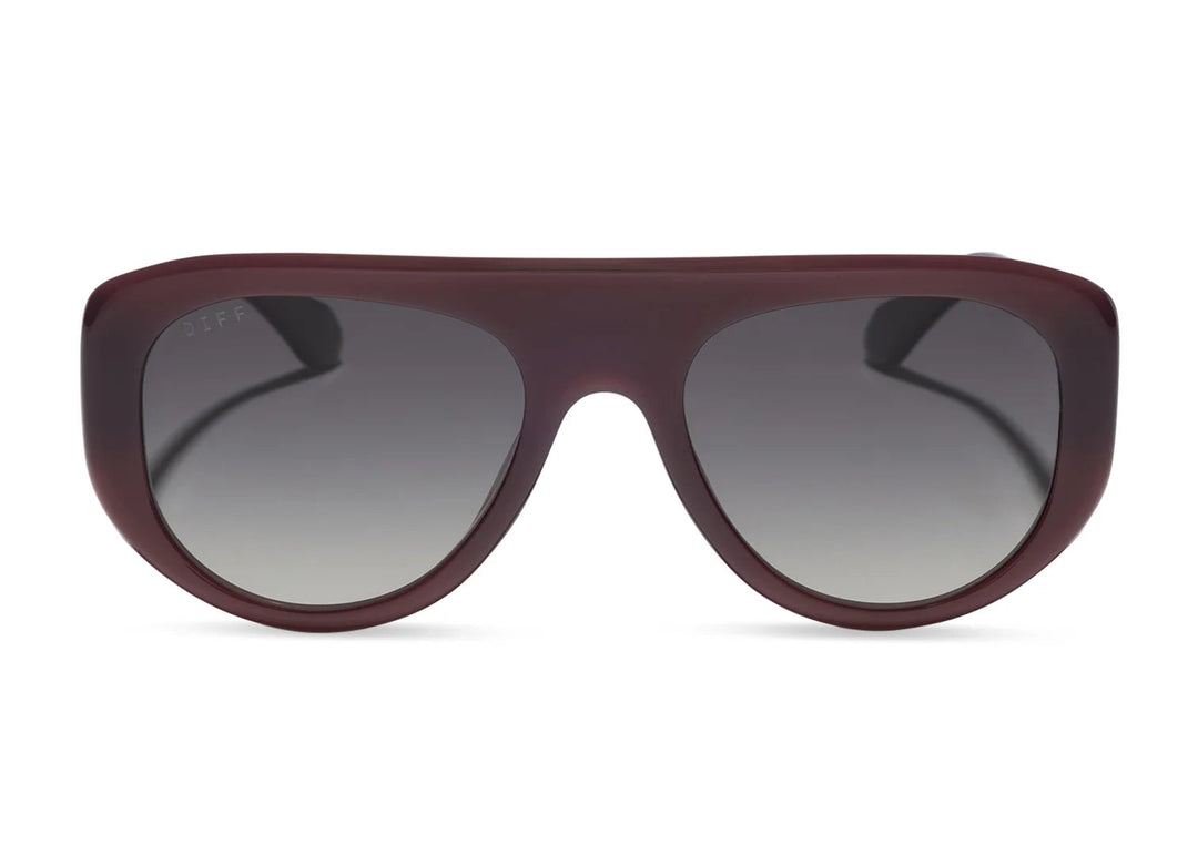 Pair of brown sunglasses with grey lens on white background