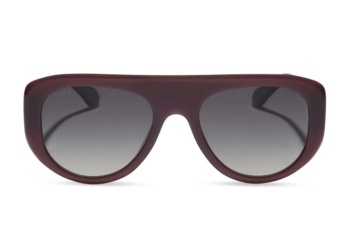 Pair of brown sunglasses with grey lens on white background