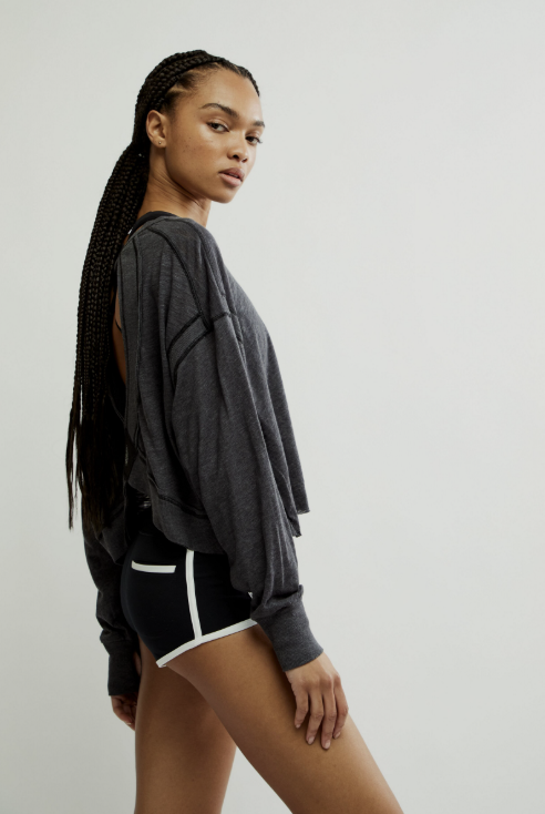 woman wearing black long sleeve on white background