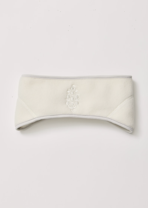 Single cream fleece headband with logo on white background