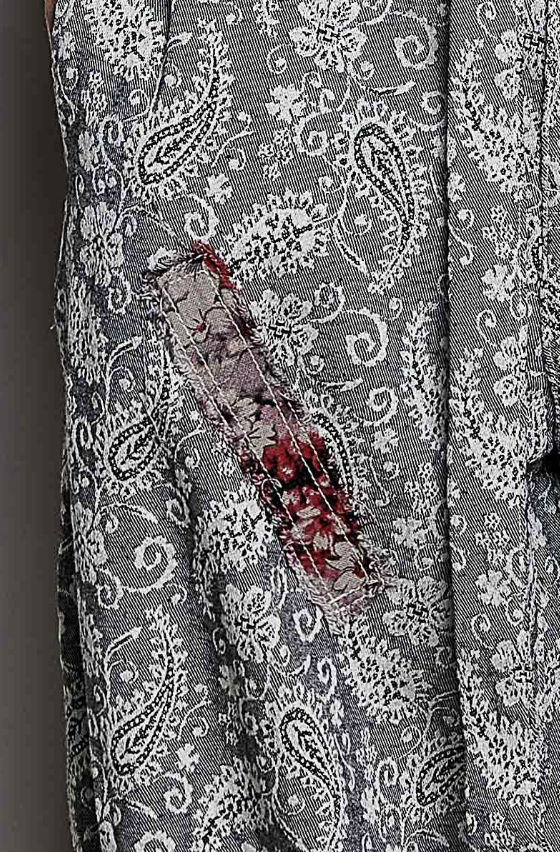 Close up of black paisley pants