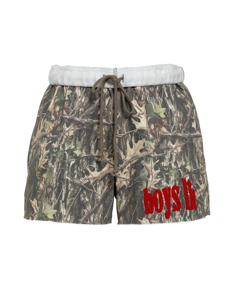 Camouflage shorts with 'BOYS LIE' printed in red on a white background