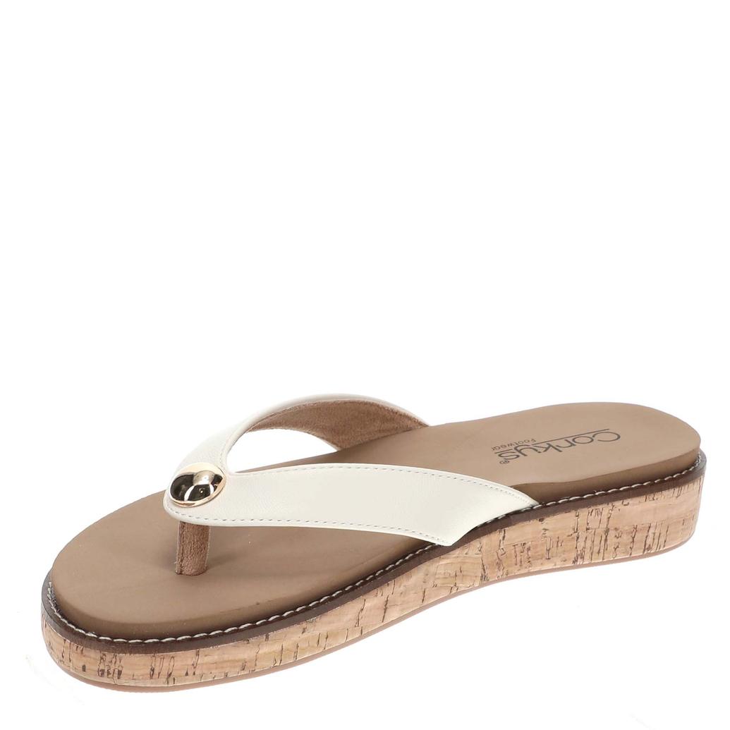 Beige sandal with a white sole on a plain background