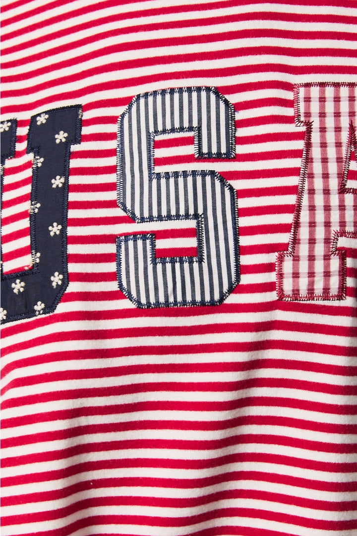 Close up of red and white stripe top 