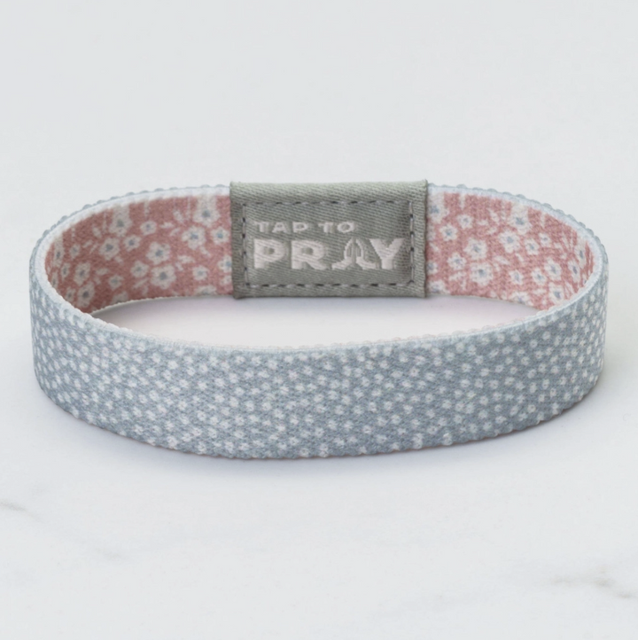 Wristband with floral pattern and &