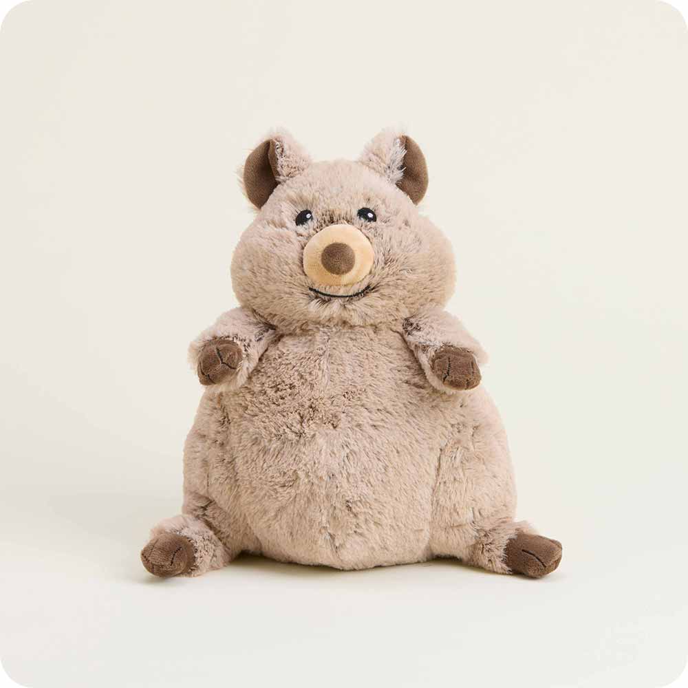Plush toy resembling a rodent on a white background